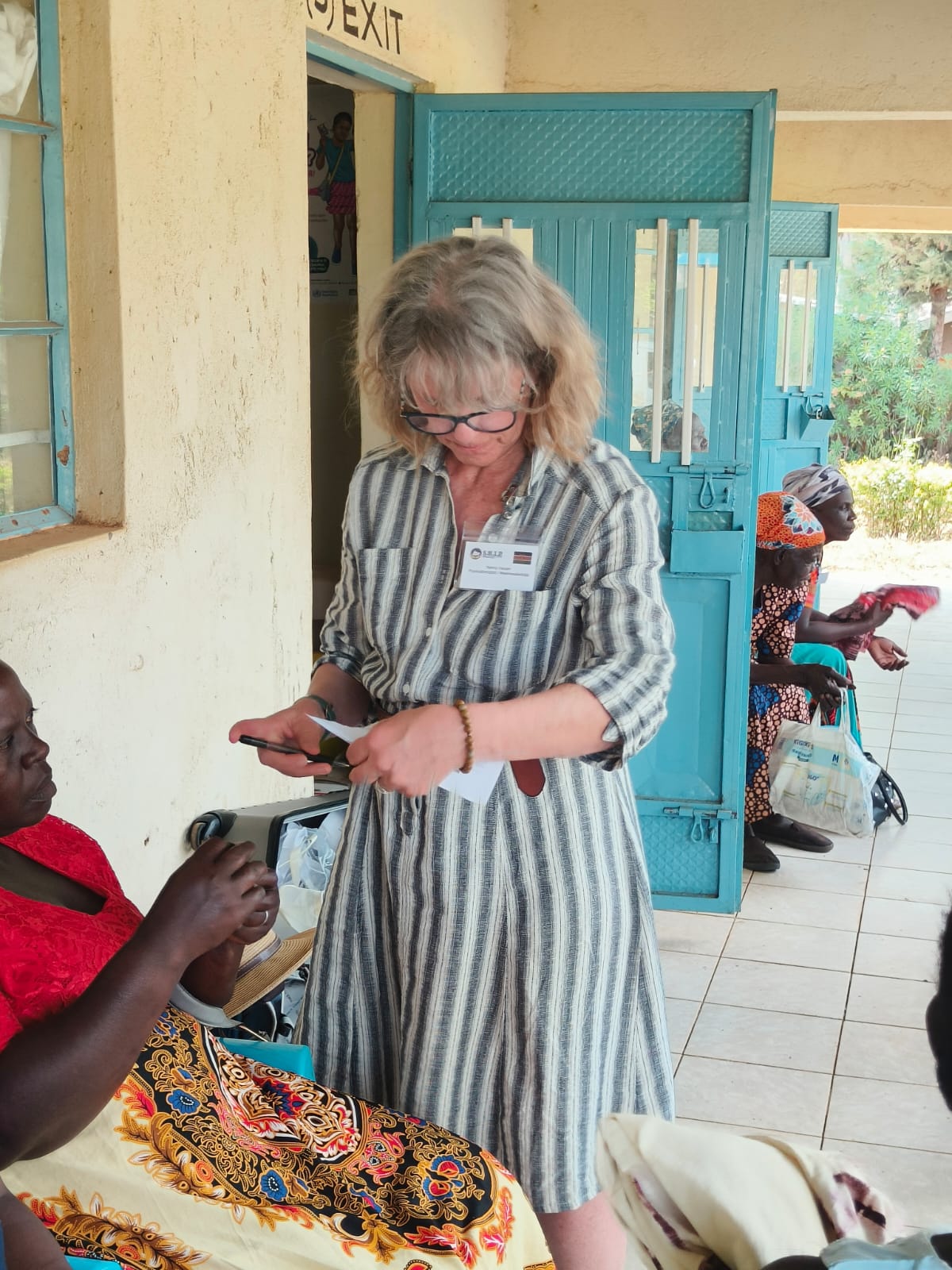 CEECK volunteer with patient