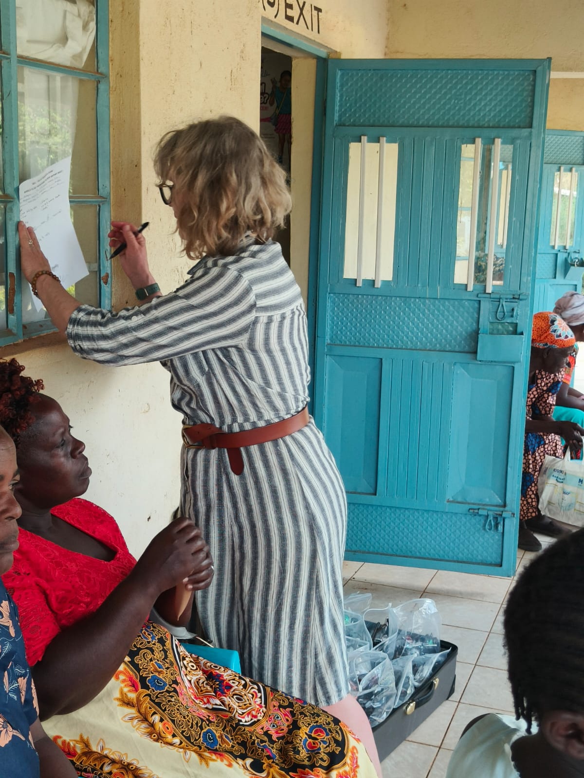 CEECK volunteer with patient